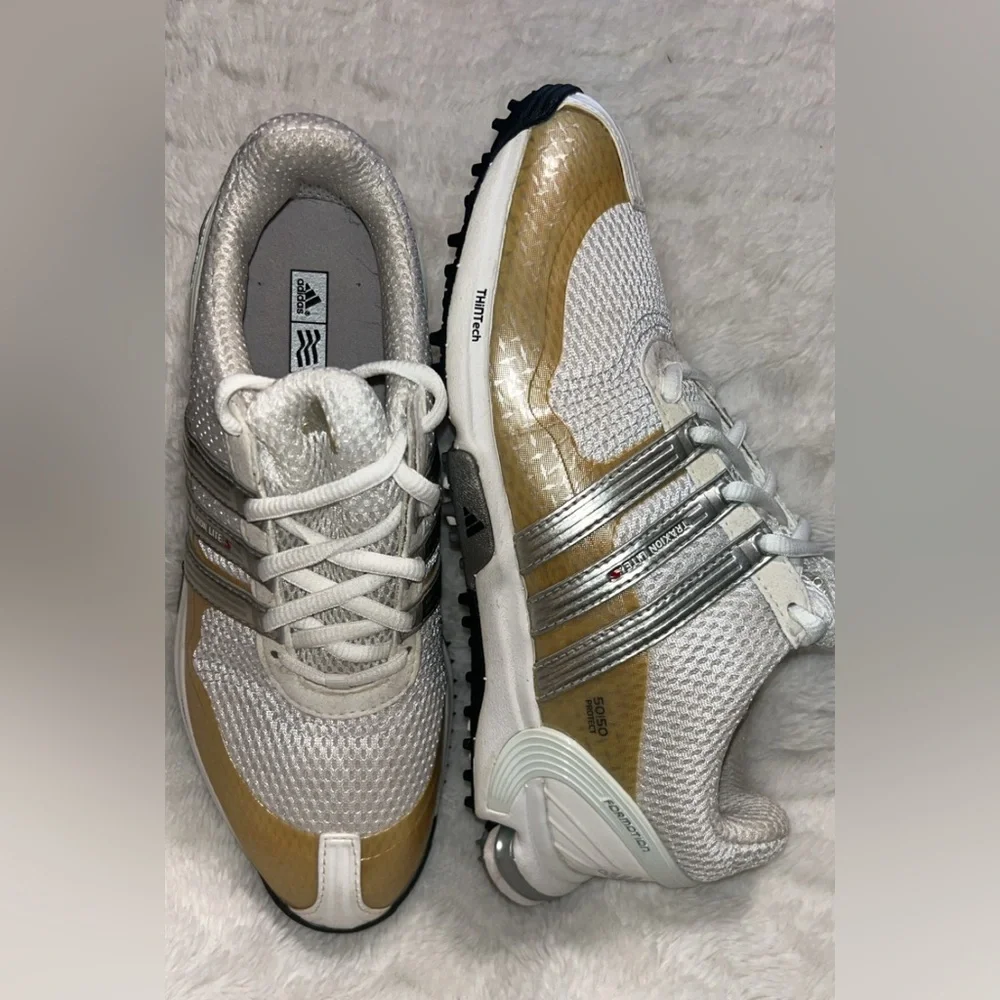 Adidas Traxion Lite S 50/50 Protect women's golf shoes.